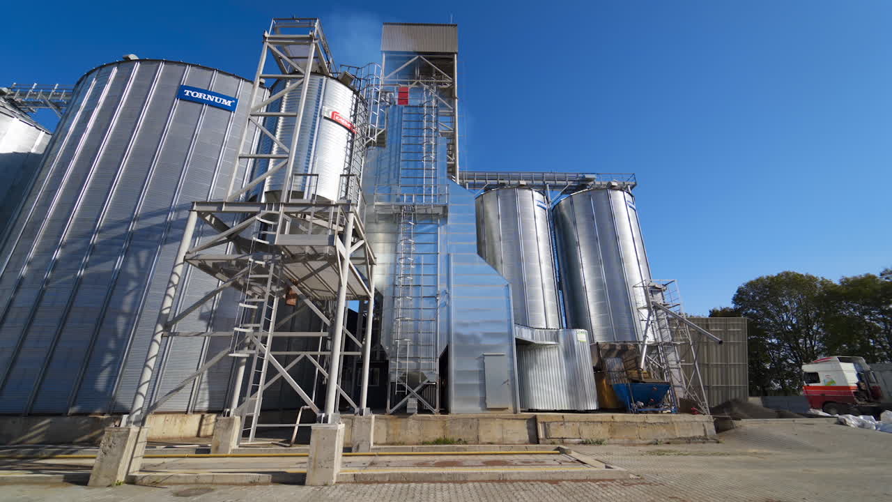 Agriculture grain silos storage tank. Modern industrial elevator for grain storage