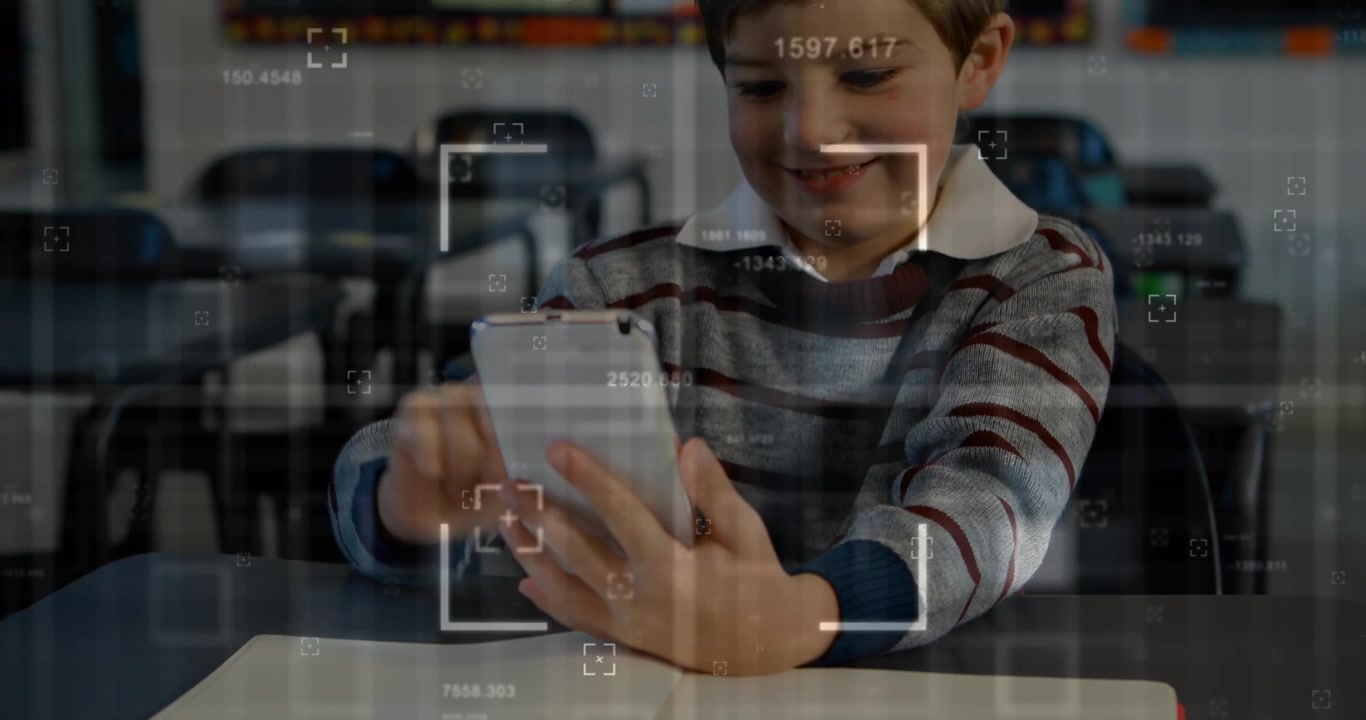 Young Boy Using Smartphone in Classroom with Digital Interface Overlay