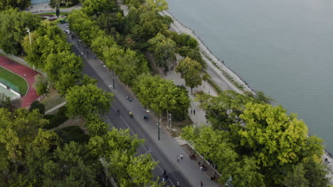 aerial - margaret island, danube river, budapest, hungary, forward lowering tilt down