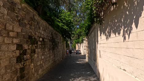 a quiet walk down a narrow alley