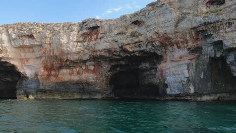 beautiful grotta delle tre porte or caves of three doors in salento, apulia in italy