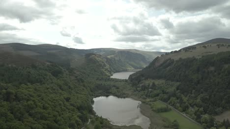 glendalough lakes surrounded by lush green valleys in county wicklow, ireland