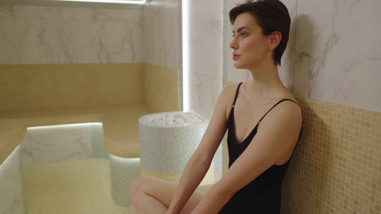 Woman Relaxing in a Modern Spa