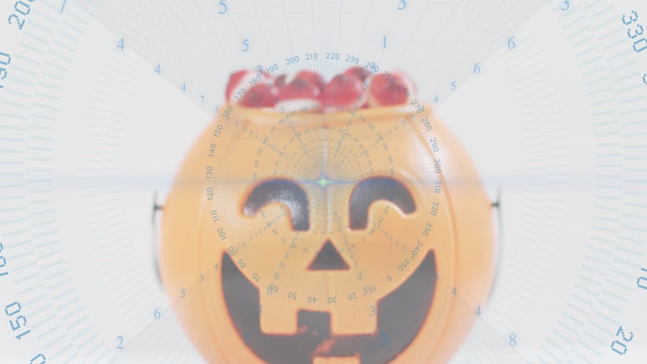 Appare un overlay a griglia radiale che ruota attorno a un secchio a forma di zucca, mappando la scansione angolare sui dolcetti.