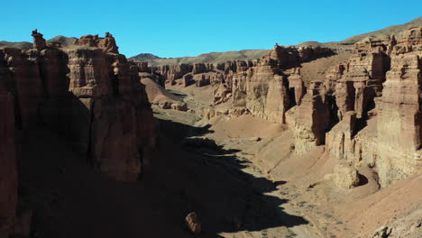 cinematic drone shot going through the charyn canyon ravine in kazakhstan