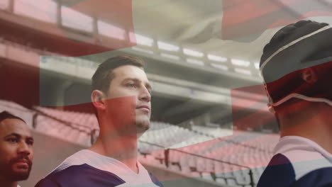 animación de la bandera de suiza sobre diversos jugadores de rugby en el campo