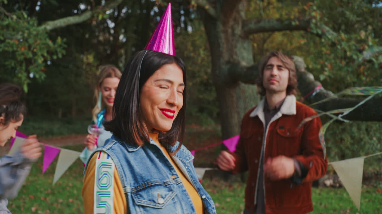 Friends Celebrating a Birthday Outdoors