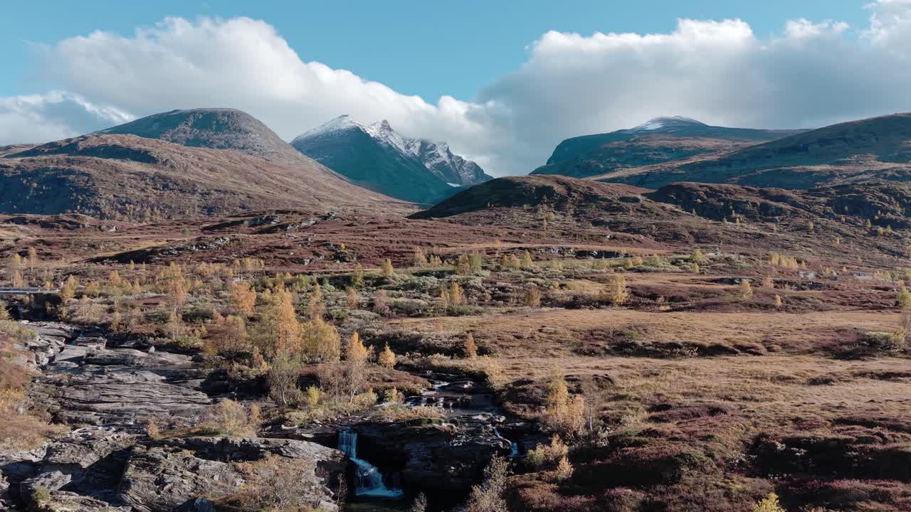 Static drone footage of landscape of Jotunheimen National Park in autumn
