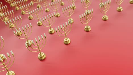 Golden-Menorahs-on-a-Vibrant-red-Background