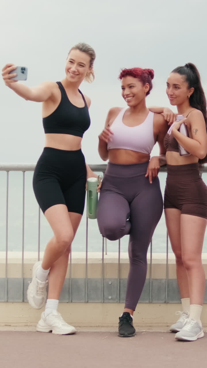 Friends Taking a Selfie After Ocean Workout