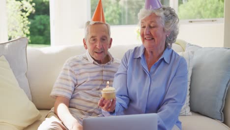 Senior-caucasian-couple-celebrating-a-birthday