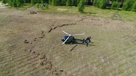 helicopter landing in a field