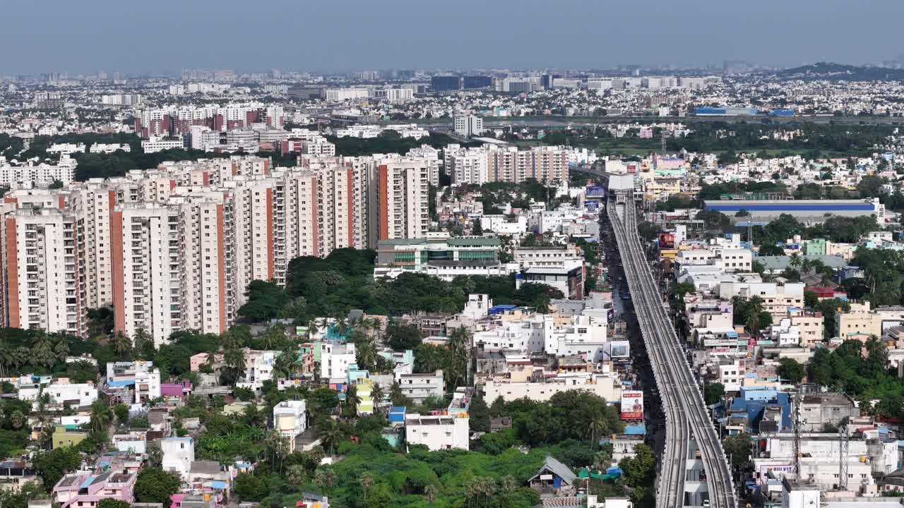 Iyyappanthangal stock footage captures Chennai's rapid growth: high-rise apartments, the upcoming Metro Rail Phase II construction, and the busy Iyyappanthangal Bus Depot