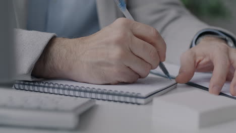 businessman taking notes