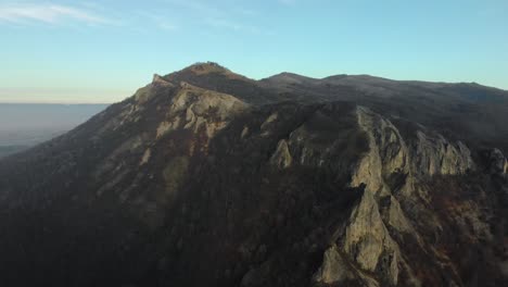 aerial shot of mountain hill with forest and cliffs-8