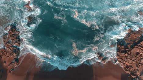 coastal afternoon drone shot over the ocean stationary view of waves