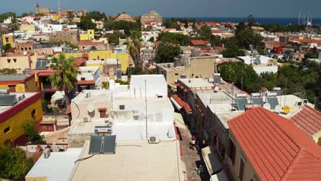 rhodes, greece: aerial drone shot of odos socratous (socrates street) with the suleiman mosque at the top,displaying medieval architecture near mediterraen sea