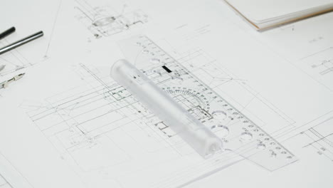 architect or engineer hands working on blueprints