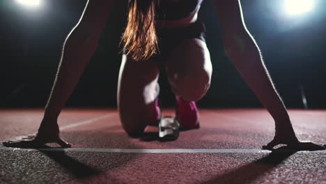 Close-up-legs-in-sneakers-athletes-are-running-pads-on-the-track-of-the-sports-complex-and-run-in-slow-motion