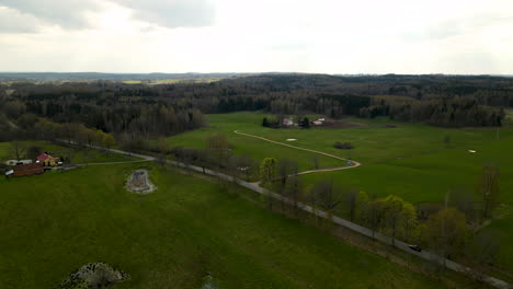 Sweeping-aerial-view-over-the-rural-town-of-Pieszkowo-Poland