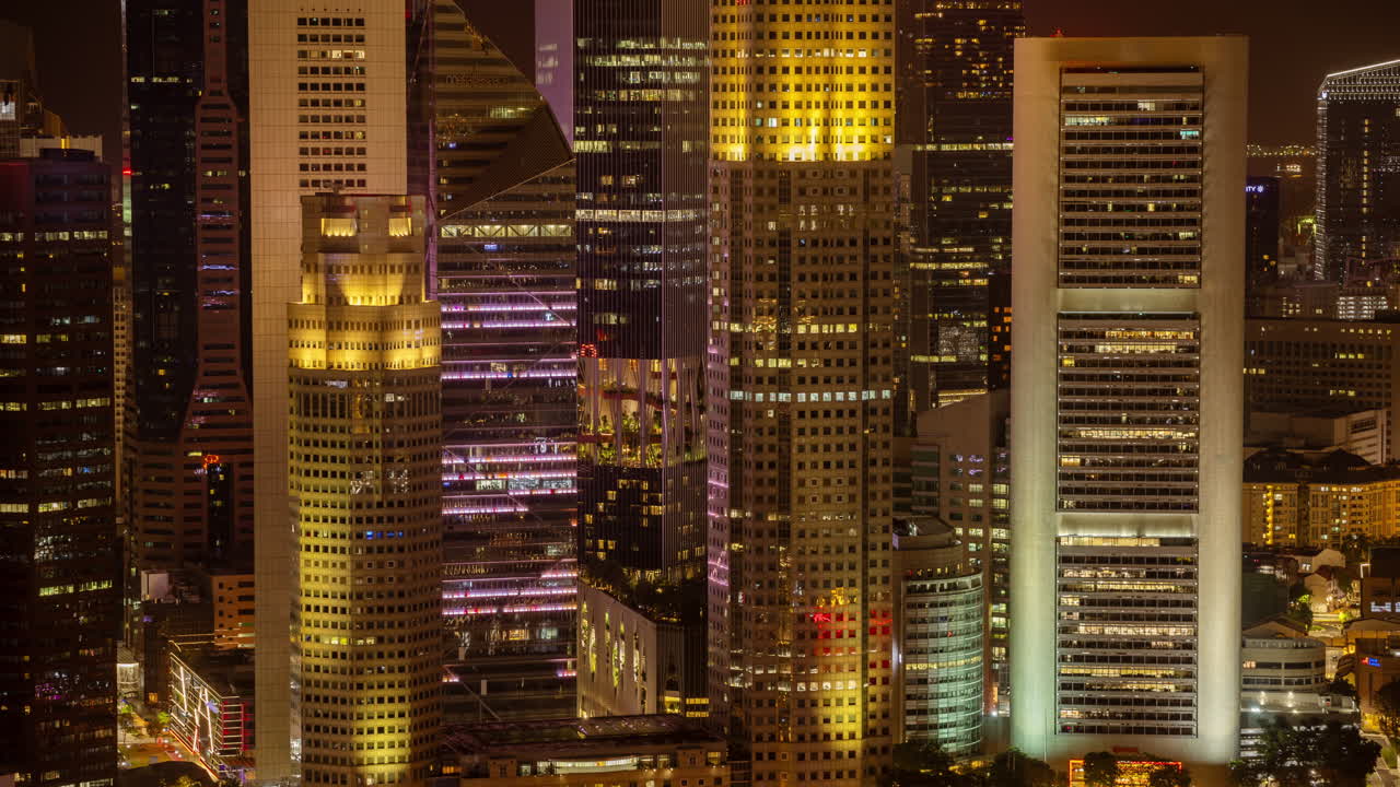 SINGAPORE - 3 MARCH 2025 : timelapse of the singapore city skyline from a high vantage point at night