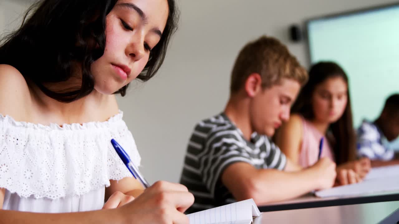 Schoolgirl studying in classroom 4k