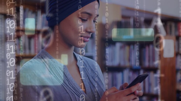 Animation of ai text and data over biracial female student in hijab with smartphone