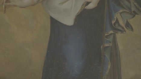 painting of the virgin mary with jesus on her arm