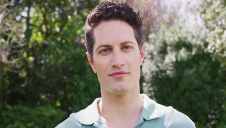 Portrait-of-happy-caucasian-man-in-garden