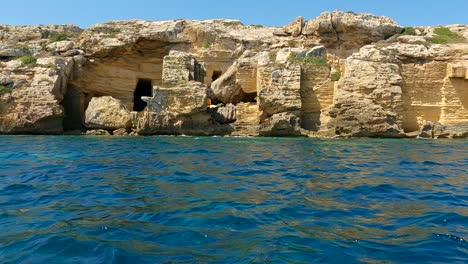 grotte bue marino ox tuff cave seen from boat in favignana, sicily