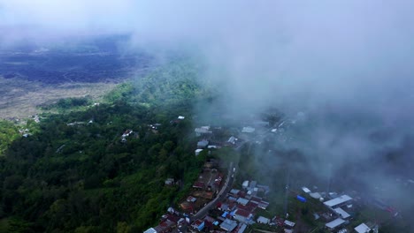 clouds above asian village of kintamani near mt batur in bangli regency, bali, indonesia