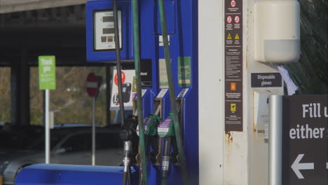 disposable gloves dispenser at petrol pump during covid-19, medium