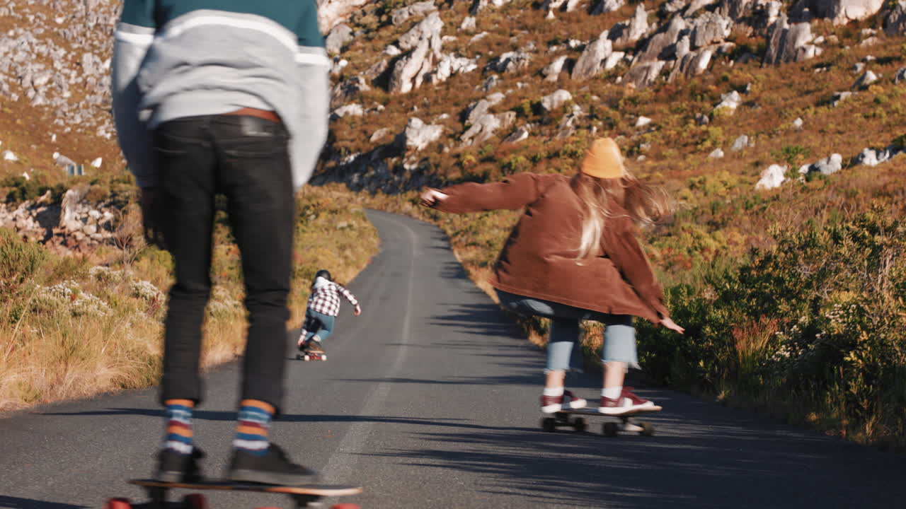 Premium stock video - Young multi ethnic friends longboarding together ...