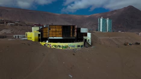 huayquique beach chile iquique building ocean abandoned sea drone panning
