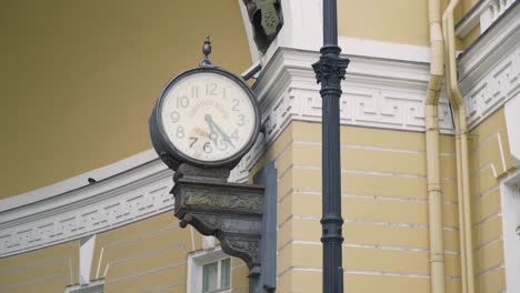 antique clock on a building exterior