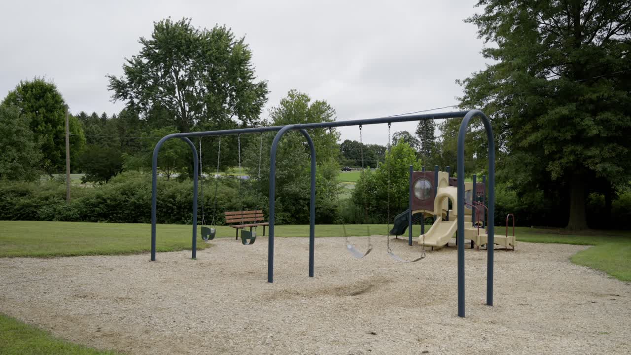 A playground in an empty park. Cloudy day