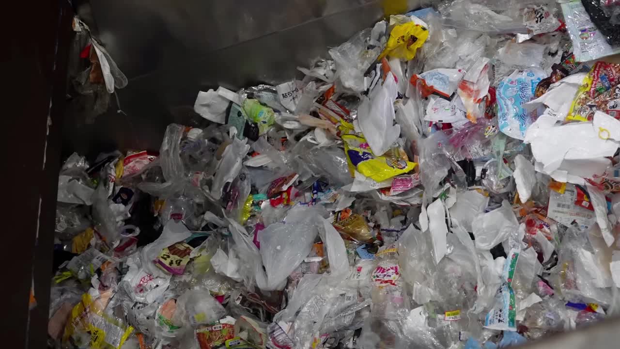 Garbage Processing Line: Initial Recycling Stage. Slow Motion.