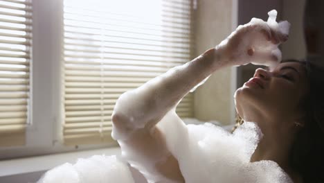 woman relaxing in a bubble bath