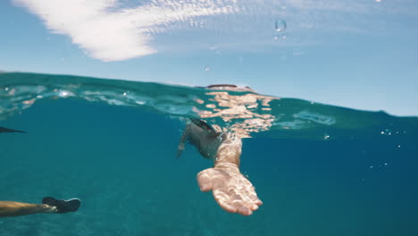 man training in the ocean