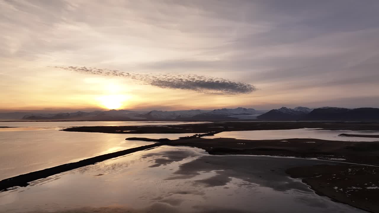 Hafnarnes lighthouse, Höfn town, Hornafjörður Lagoon and majestic Vatnajökull glacier aerial view, Iceland's stunning southeastern coastline.