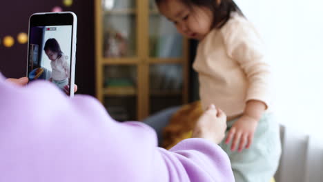 asian mother with her baby