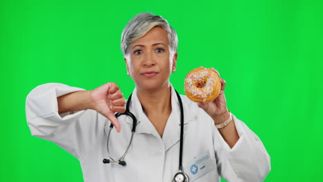 Doctor,-thumbs-down-and-donut-portrait-on-green