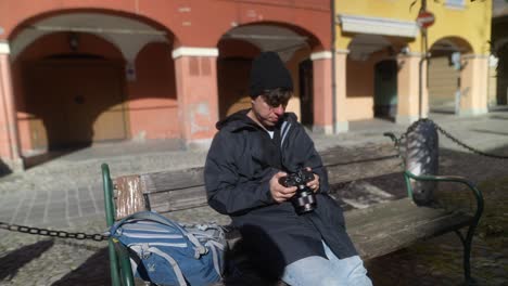Photographer taking pictures in a European town