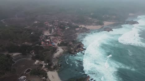 Aerial-orbit-shot-of-Baron-Beach-at-Yohgakatya,-Indonesia-at-day