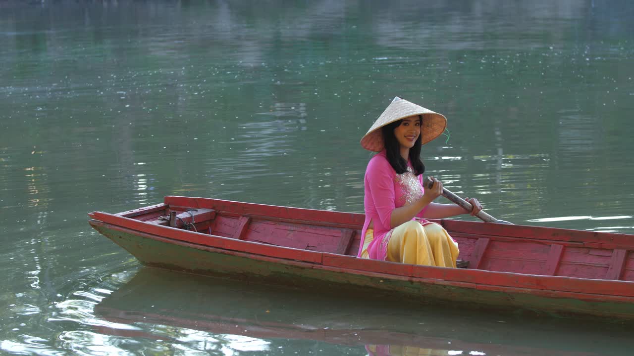 Vietnamese Girl With Traditional Dress (Ao Dai) On Boat, Video In 4K