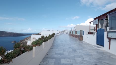 Walking-on-empty-streets-of-Oia,-Santorini