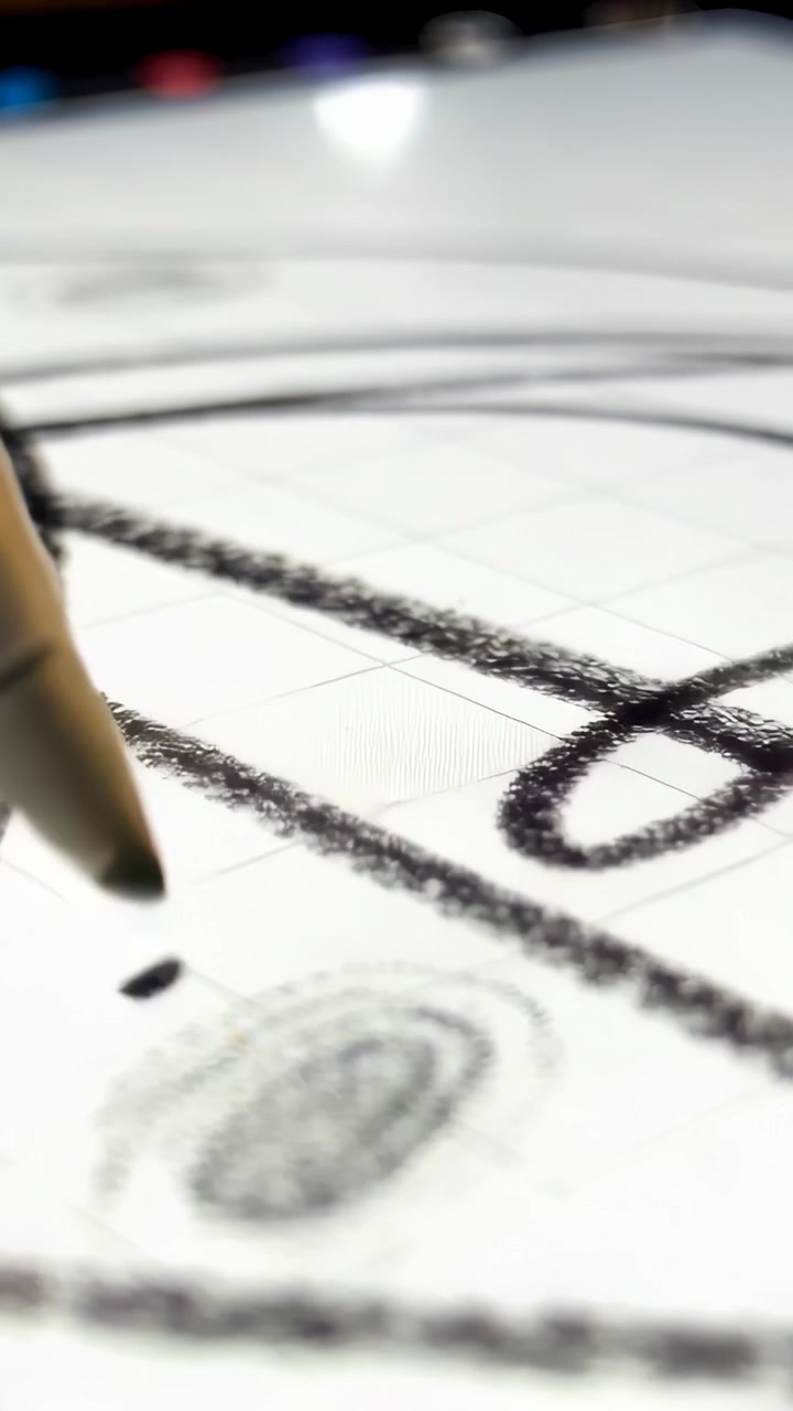 Vertical video: Drawing stylus making heavy strokes on grid tablet after tap, making abstract art
