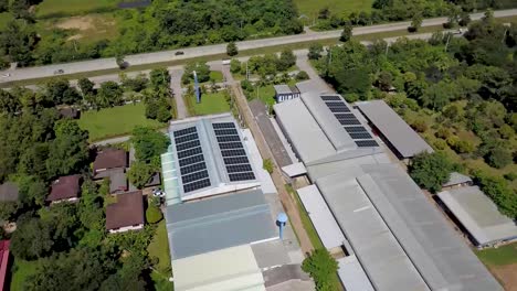 Aerial-View-of-Large-Scale-Solar-Panels-on-Modern-Factory-Roof