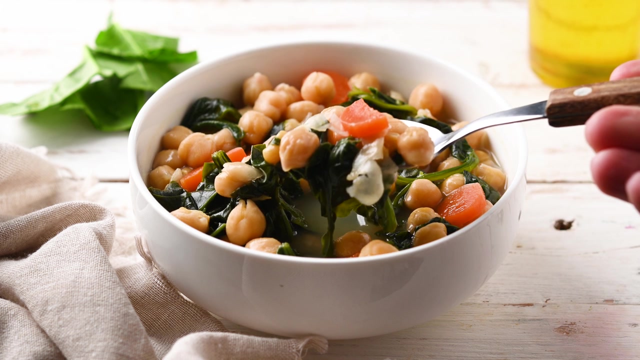 Chickpea and Spinach Soup with Carrots in White Bowl