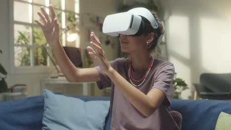young person using a vr headset at home
